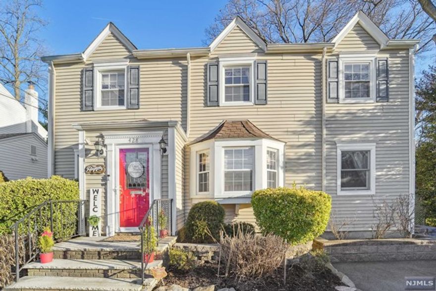 Warm and inviting colonial offering three levels of living and multiple areas for outdoor entertaining. A paver walkway beckons you to the front door and, upon entering, a spacious formal living room with dentil crown molding sets the tone for a home that is sure to impress. The first floor is additionally outfitted with a formal dining room, casual family room, stunning kitchen with SS appliances, granite counters and recessed lighting, powder room and access to the sunroom leading to the covered patio. The second floor delivers with a tastefully updated bathroom and four spacious bedrooms, including one with sliding glass doors which open to the expansive rear deck overlooking the tiered backyard, reminiscent of a mountainside garden evoking a feeling of zen. The finished basement level consists of a large rec room, kitchenette, laundry room and full bathroom. Noteworthy features include in-ground sprinkler system, central AC and close proximity to Radcliffe School.