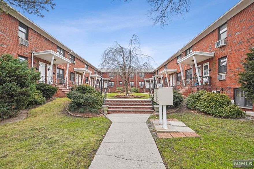 Beautifully Updated 2 Bedroom Unit perfectly located for NYC Access and surrounded by Parks offering Tennis, Handball and Basketball Courts, Bicycling, and so much more. This lower level Corner unit has many windows throughout for natural daylight. The Modern Updated Kitchen boasts a Breakfast Island, Granite Countertops and Stainless Steel Appliances. Bedrooms are nicely spaced apart in this spacious condo. Super low taxes and Maintenance Fees that include Heat, Water, HW,Common Area Landscaping and Snow Removal. Assigned Parking $40 month and lots of Street Parking out front. Garages on premises are currently wait-listed.