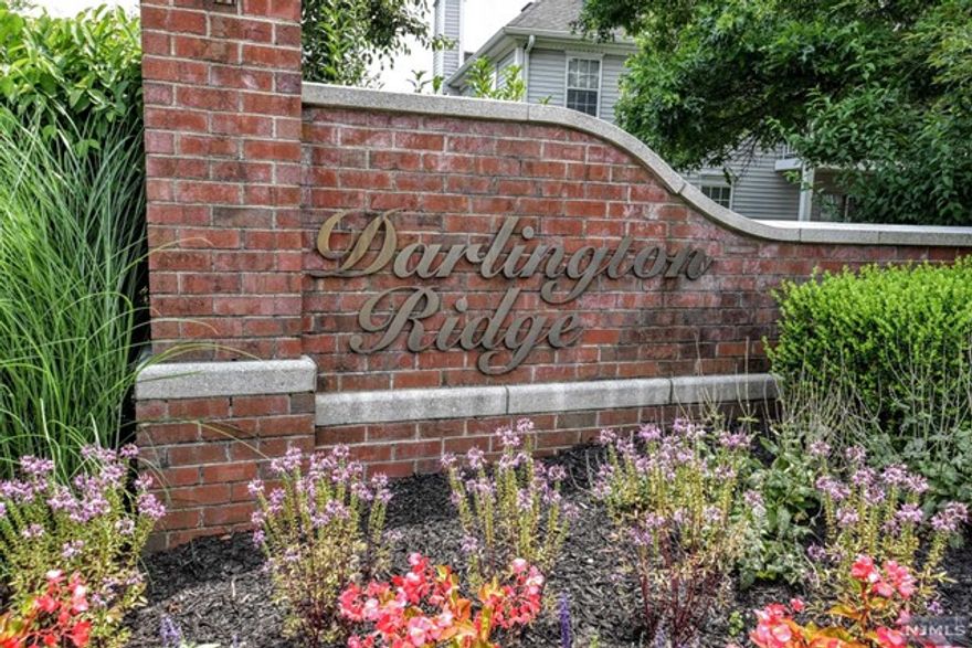 Darlington Ridge is a peaceful, extremely well-maintained, pet-friendly community nestled in the heart of Mahwah Township, ideally located in historic Bergen County. Super convenient location, mere minutes away from everything you need including schools, shopping, incredible restaurants, public transportation & much, much more. Location is great for commuters - only 31 miles to NYC. This 1 BR condo is the perfect home for first-time buyers or for someone looking to downsize. WHY RENT WHEN YOU CAN OWN FOR FAR LESS?? It's a "no-brainer!" This extremely low maintenance condo offers simple, single-floor living, low taxes, and convenient, ground-level access. Looks out to wooded area vs. the parking lot, and is a stone's throw to community pool, clubhouse and playground. Freshly painted, brand new carpets & water heater. You're going to love it!