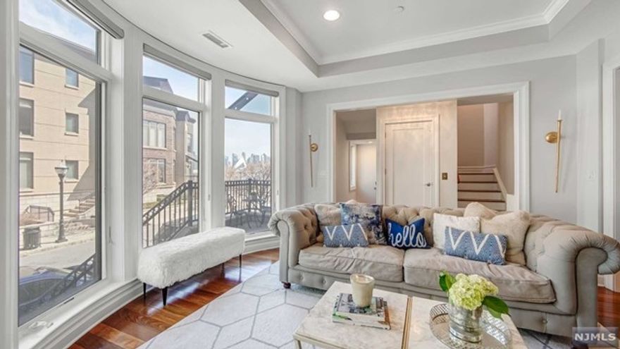 Vibrant and genuinely comfortable, 3 Oxford Landing fulfills your desire to live peacefully in a distinguished neighborhood overlooking Manhattan. The home is set on a quiet, residential street with little everyday traffic. Its 3,140 square foot floor plan feels quite balanced, with four true en suite bedrooms lying upstairs and away from your personal two-car garage. The living areas are open and airy, and include multiple terraces. You'll love the home theater. Choice appliances and upgrades are sprinkled throughout. And a private elevator makes everyday living easier. 3 Oxford Landing is a proud member of Henley On Hudson, a well-manicured, community of luxury homes whose amenities include a concierge, swimming pool, two fitness centers, children's playroom and cinema. Residents relish the direct access to the New York Waterway and unparalleled views of The Greatest City in the World.