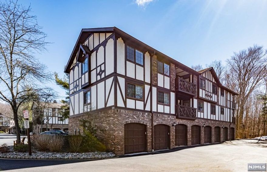 Beautifully maintained 2 bedroom with den with 2 full baths, one-car garage, and an ample storage unit in desirable Ridge Gardens. Freshly painted, new carpeting, and new window treatments. Eat-in kitchen with recessed lighting, bright and airy large living room with new recessed lighting, and separate formal dining room with door leading to an outside deck overlooking the peaceful woods and western views. A spacious primary bedroom with a walk-in closet and full bath. 2nd bedroom is spacious with a double closet. The 3rd room can be used as a bedroom or home office/den. Side by side laundry with shelving conveniently located near the bedrooms. The garage and storage unit are in the same building, conveniently located close to the front entryway. Amenities include a pool and tennis/pickleball courts. Quick access to shopping, all 3 schools, library, restaurants, pools, Ramapo Reservation, Campgaw, Darlington, highways, and NYC transit. You're going to love the Mahwah lifestyle!