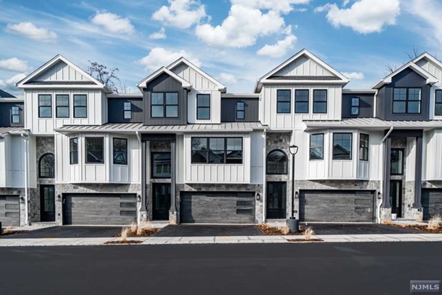 Welcome to The Aida, a brand new luxury rental townhome community in ultra-desirable Old Tappan. These spectacular townhomes offer 3 levels living space. Each unit boasts over 3,000 sq ft with 3 bedrooms, 3.5 bathrooms and a 2 car garage. Stunning exterior facades and truly impeccable interior finishes. Open-concept main level with designer kitchens that feature huge oversized center islands, BOSCH appliances, soapstone countertops and custom cabinetry. Living Room with custom fireplace and dining room w. wet bar that leads to huge deck off dining room. Lower level family room w. full bathroom, walk out patio and access to garage. Dream Primary bedroom suites with spa-like en-suite bathroom and huge walk-in-closet. Radiant heated flooring in bathrooms. SMART home features include Ring doorbells in front & back of units along with smart garage doors. Old Tappan offers a quiet neighborhood feel & excellent school system, just a few miles from NYC!