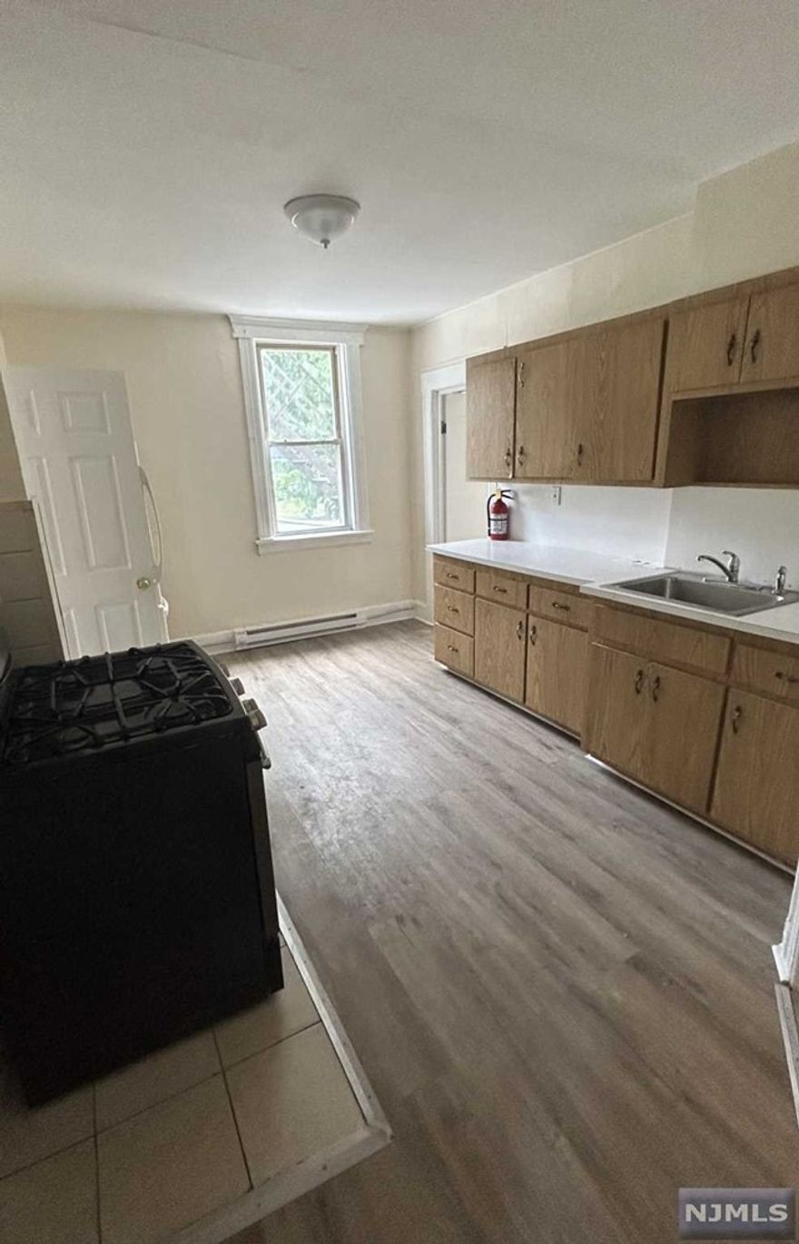 Newly renovated 3 bedroom apartment. Large Kitchen & Living Room. Second floor of 3 family, small pet considered.