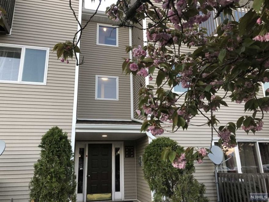 This fabulous unit in the very desirable Tributary Gardens of Englewood NJ. Updates are eco-friendly and energy efficient, and include top of the line amenities! New kitchen with stainless steel appliances, Brand New convection oven, counters, stainless steel sink with garbage disposal. D/W, and under cabinet sensor lighting. Spacious and bright Living/Dining room combination. Two bedrooms complete this main floor, and the beautiful Skylights throughout, with large double glass sliding doors lead to a lovely terrace, that brings in maximum sunshine. Updated main bath with marble floor, bidet, and gorgeous fixtures. Up the spiral staircase is a large loft with a bedroom/office/flex room, a bathroom, and an additional room beyond that, is the storage area, and laundry. Lots of closets throughout the unit. One reserved parking space included, directly in front of the unit. An additional parking space available for $50/mo. Outdoor Pool! Picnic area. Near all conveniences. Avai 7/1.