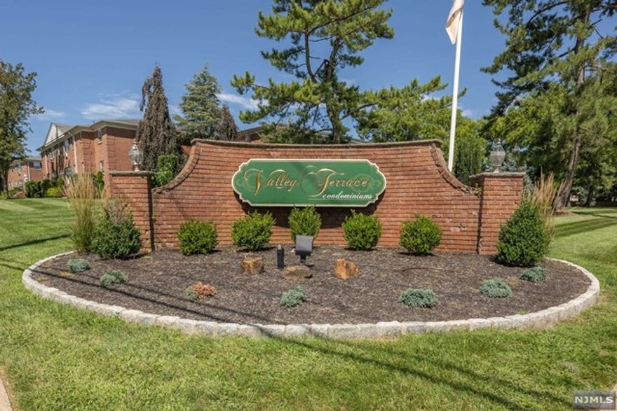 PRIME LOCATION! Very well maintained 2nd floor condo in desirable Valley Terrace. Unit features spacious living/dining room, renovated open kitchen w/island & SS appliances, large hall closet for storage, full bath w/ tub/shower, & great sized bedroom w/ huge walk in closet! Other feat. include basement storage, ample parking, hardwood under the carpets & newer AC units. Inground pool, heat, water & sewer are included in HOA! Owner only pays electric! Close to NYC transportation, bus stops, shopping, restaurants & more!