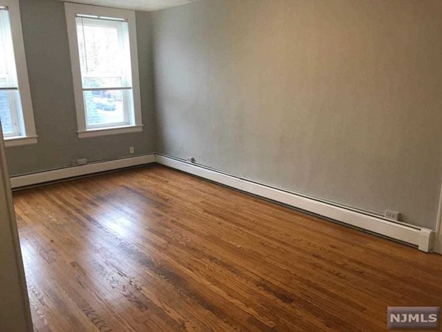 Updated 1 Bedroom Apartment w High Ceilings, Ample Size Rooms and Hardwood Floors throughout. Close to Transportation, Shopping, Schools and House of Worship. This Quality 1 Bedroom Rental Wont Last!!! Coin Operated Washer & Dryer on premises.