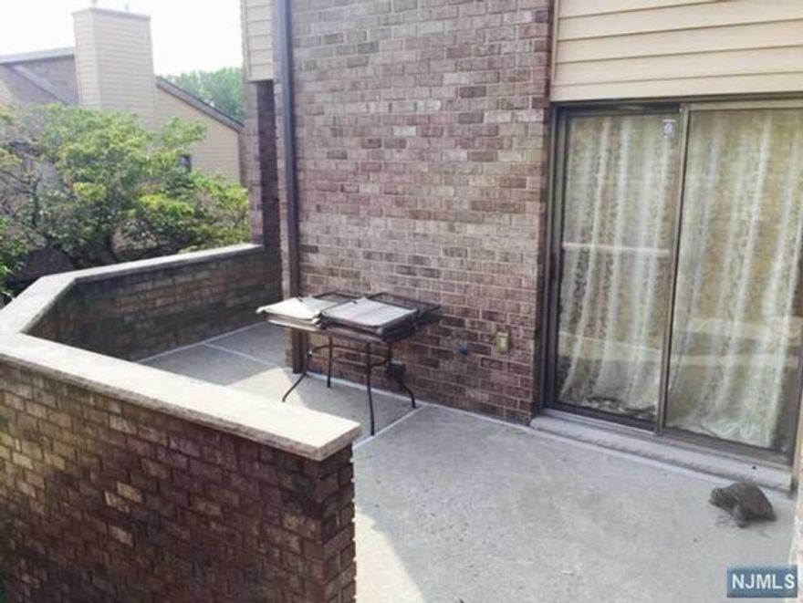 Convenience location! Spacious, updated 2 bedrooms and 1,5 bathroom unit! Updated kitchen, bathroom. Hardwood floor. Highlights bright living room with beautiful stone fireplace, and dinning room. Eat-in kitchen, door to front patio. Good size bedrooms. Oversize 1 car garage plus private outdoor parking space. near Fort lee community center, super market, # 4 elementary. Close to NYC transportation. Don't miss the chance to move in Fort Lee township!