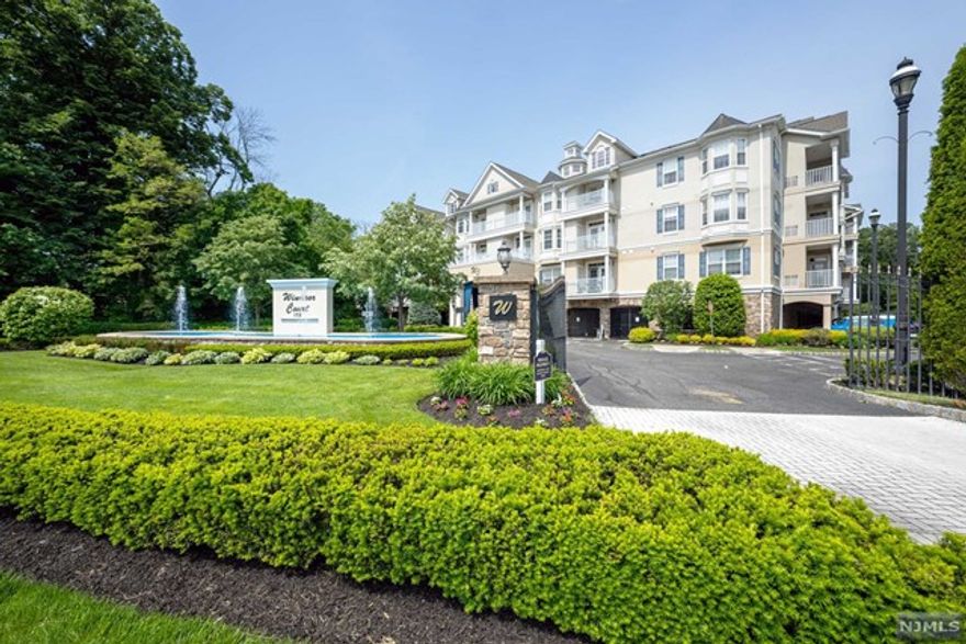 Experience Luxury living in this key locked condo building of windsor Court. Enter the large lobby with community Rm,Fitness area,access to garage space,elevator to upper living floors.This is1235sqf condo built in 2006 offers a spacacious LR with French door to a deck overlooking a private scenic courtyard.SS appliances,wooden cabinets, pantry and breakfast bar complete the kitchen with a dining area adjacent to it. Renovated Hardwood floor for 2bd Rm. Behind Frech doors is a foyer leading to the Master Bedroom with tray ceiling and walk in closet. MBTH has separate tub and enclosed stall shower with grab bars.Second Bedroom w hall bathroom for privacy.One garage parking spot,lots of outdoor parking,fifness Rm, community Rm and water are included in low maintenance fee.