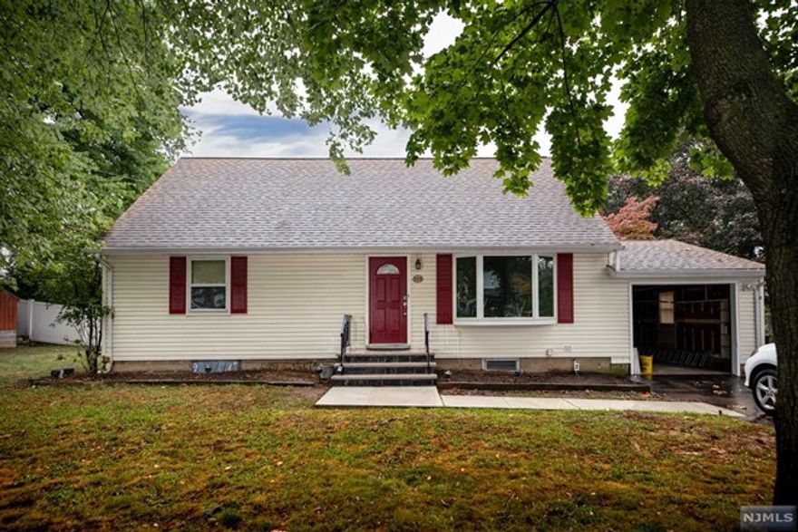 Welcome to this 4 bedroom 2 full bath home. Situated on quiet street in desirable Paramus. Enter to newly finished hardwood floors, living room with fireplace, formal dining, and all new kitchen with stainless steel appliances. First floor offers 2 nice size bedrooms and a recently renovated full bath. Walk up stairs to 2 larger bedrooms with another recently renovated full bath. This home also offers basement with 2 rooms, one with a bar area great for entertaining and a fireplace, plus storage and newer washer/dryer. Home has a garage with remote. Bonus shed for storage. Home is available now, must see!