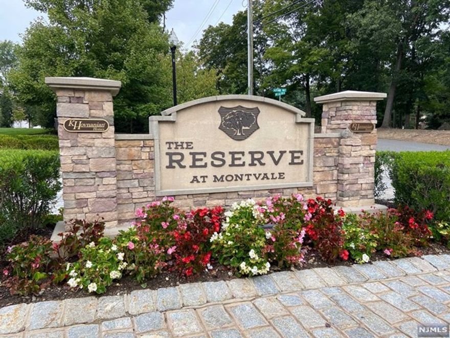 Stunning end unit townhouse nestled in the highly sought after Reserve at Montvale; 2 Bds/3 Full baths, gas fireplace, 1-car garage & private patio. It boasts natural light and the latest interior decor w/plenty of high-end finishes, custom Hunter Douglas window shades on 1st fl., recessed LED lighting, detailed woodwork/crown moulding & dark hardwood flooring on both levels. Open Concept layout ideal for entertaining. Spacious foyer, full bathroom on the 1st floor plus mudroom with access to 1 car garage. Private Patio off of the LR / DR. Lovely kitchen with breakfast bar, granite countertops, SS appliances & highest level upgraded 42' soft close cabinets, undercabinet lighting & custom backsplash. Head upstairs to the luxurious Primary BR w/tray ceiling, ensuite Bathroom and custom WIC. Spacious 2nd bedroom. Laundry level on this level for your convenience. Children's playground and beautifully kept community. Close to everything, great school system. A MUST SEE HOME!