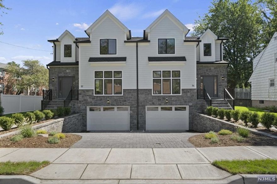 This modern NEW CONSTRUCTION LUXURY TOWNHOUSE IN TENAFLY makes a statement. The Interior features high end finishes from hardwood floors to tiling. First Floor 9FT CEILINGS, features a large entry foyer, a bright sunny living room, powder room, open layout family room & dining room, large chef's kitchen with stainless steel appliances, 7 foot center island, quartz countertops. 2nd floor offers master bedroom with master bath, large walk in closet, 2 spacious en suite bedrooms, a large laundry room, Lots of closet and storage space. Ground floor an additional large family room/rec room, a bedroom and a full bath, utility room. 1 car garage, full house generator, central vacuum, central air, Anderson windows, wired alarm system. Close to downtown, public transportation, schools and houses of worship.