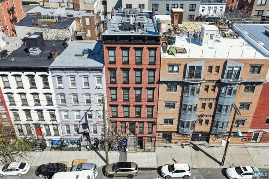 Liberty Realty is pleased to offer 327 Adams Street, Hoboken, NJ 07030. A 10-unit building comprising 8 residential + 2 commercial lofts. 25X100 lot. Located 4 short blocks to Church Square Park. The property completed an extensive gut renovation end of 2017, it is 100% leased with a gross rent average of $4.11 sf/mo. This offering represents the opportunity to acquire the asset and add value by increasing the rents to market as leases renew in the short term. All units are separately metered for electric and gas. Tankless hot water systems in place. Washer/dryer combos & private balconies in all residential units. The NOI is $239,677 5.05% Caprate *Owners hold real estate sales agent/broker licenses.*