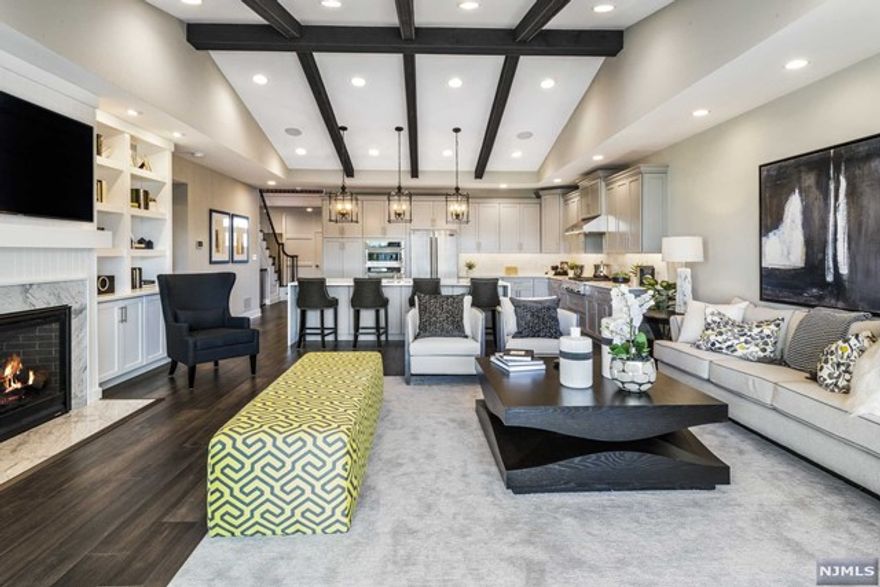 Move-In Ready! The Valeri's impressive two-story foyer boasts a lovely view of the turned stair and formal dining room. The expanded great room with a designer fireplace and well-appointed gourmet kitchen with a shared cathedral ceiling awaits, united by a large center island with a breakfast bar. The private first-floor grand primary bedroom suite includes, dual walk-in closets, a private bath with double sink vanity and luxe shower with seat. On the second floor, a large loft, three bedrooms, and two full baths. Additional desirable features include a conveniently located first-floor powder room and laundry, finished basement, 9' ceilings, hardwood flooring throughout a majority of the home. Welcome home to The Reserve at Franklin Lakes, the quintessence of luxurious living and captivate beauty