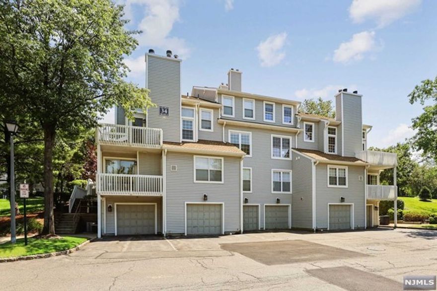 Gorgeous 2 bed 2 bath renovated with attached Garage. Wood laminate flooring throughout. Beautiful expanded, modern, open kitchen. Both baths have been updated. All windows have been replaced and HVA . Shows really well!! Fireplace , W/d in unit. Attached garage. Owner has NJRE license.