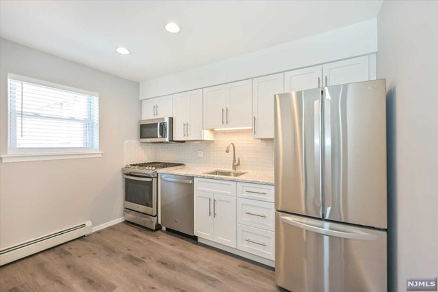 Beautifully renovated in 2023, 2nd floor condo for rent in Manchester Village! Enter into open concept main living area to include living room & dining room w/ HW floors. The living room is spacious w/ large window that allows plenty of natural light to fill the room. Cased opening leads into dining area w/ ceiling fan & large pantry closet. The completely renovated kitchen offers custom white cabinets, new stainless steel appliances & sink, Quartz countertops & tile backsplash! The bedroom is located off of main living area & offers hardwood floors & outfitted walk-in closet. The brand new full bath is just across the hall featuring tub shower, storage vanity w/ Quartz countertops & large linen closet. This condo has new white blinds on all windows. Association offers outdoor pool. This unit is conveniently located near NYC transportation, major highways, schools & shopping. Tenant report, credit application, proof of income, rental application and 1 month broker fee required.