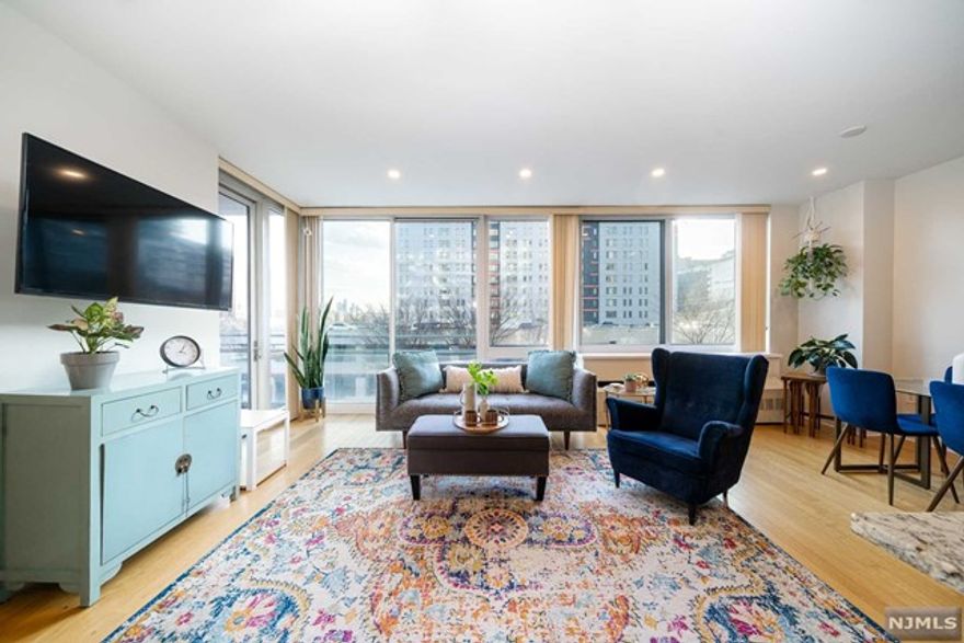 Introducing 306 at One Hudson Park, a dramatic 1264 SF, 2 BR / 2.5 BA w private terrace & 2 tandem garage parking spots. Sunlit expansive, open living room, dining room, & kitchen w oversized windows & private terrace w NYC views. Chef's kitchen w massive granite peninsula & SS appliances. Dreamy king-sized primary BR w ensuite bath, new double sink vanity, tub, separate shower & 2 large custom walk-in closets. 2nd BR w ensuite bath w tub & large custom closet. Powder room, newer in-home W/D, hardwood flooring, recess lighting & storage galore complete this special home. Amenities: 24-hour doorman / concierge, Amazon Hub, Shuttle to Port Imperial Ferry, furnished rooftop lounge & BBQ w NYC views, coy pond garden, indoor pool, gym, playroom & community room. Located in the heart of Edgewater, steps to the Hudson River Waterfront Walkway, NYC transportation, City Place & Edgewater Commons shopping centers, fine dining, cafes and parks. Truly luxury living on the Gold Coast!