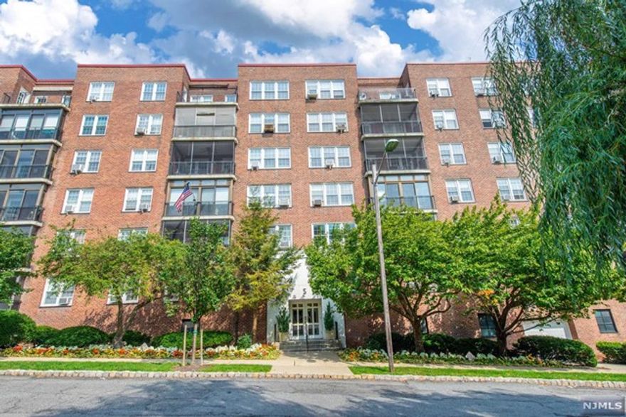 Amazing Location! Spacious and light filled condo in the heart of downtown. Features Beautifully Updated Kitchen w/ Breakfast Barand bathroom, Open Floor Plan, parquet floors, Generous Living Room and Bedroom plus enclosed balcony with NYC view! Garage parking and storage space included. Laundry on site. Building features elevator and intercom as wellas roof top deck with spectacular views. Walk to vibrant downtown shops, restaurants, theater, and more! Close toWalnut St and Bay St train stations. HOA includes heat and water.