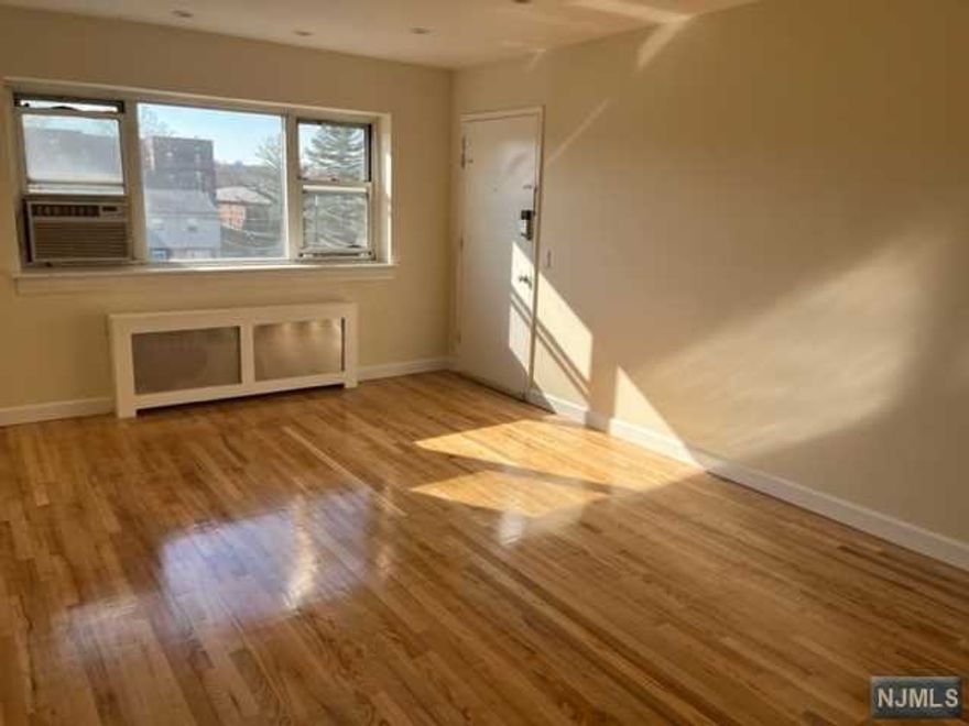 Sunny and Bright unit on the 3rd floor. 2 bedroom 1 Bath, ardwood floors all thought the unit. Updated kitchen with stainless steel appliances, updated bathroom. Heat and hot water are included. One designated parking space. Convenient Location from GWB, Bust stop to the NYC, Parks, School and stores. A must See.