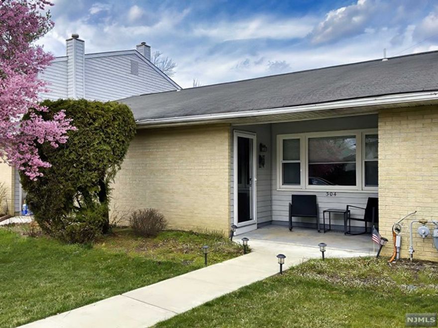 One floor living at it's best! This spacious two bedroom condo features a living room, dining area with a bonus office nook. Newer floors, updated bath and kitchen, with a stackable washer/dryer in the unit. Enjoy the outdoors either relaxing on the covered front patio or through the sliding glass doors in the primary bedroom onto your private fenced in patio . Spacious storage closet outside and one assigned parking space with additional open parking available. Conveniently located to shopping and transportation and a short ride to the beach! This one won't last so call and schedule your appointment today!