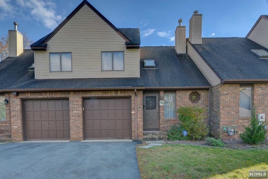 WHAT A FANTASTIC OPPORTUNITY - RARELY LISTED DEVELOPMENT IN POMPTON LAKES, TUDOR VILLAGE IS CLOSE TO THE TOWN CENTER AND NYC TRANSPORATION. BRING YOUR TOUCHES TO MAKE THIS HOME YOUR OWN. SKYLIGHT IN ENTRY FOYER MAKING THIS SPACE LIGHT AND BRIGHT, HALF BATH AND ENTRY CLOSET. LIVING ROOM, DINING ROOM AND KITCHEN IS OPEN AND AIRY WITH SLIDERS TO DECK. SECOND FLOOR OFFERS 2 BEDROOMS, FULL BATH AND WASHER AND DRYER. LOWER AREA WITH LARGE SPACE AND HIGH CEILINGS TO CREATE A FAMILY ROOM. SEPARATE SHOWER STALL. HURRY AND MAKE THIS YOUR HOME TODAY.