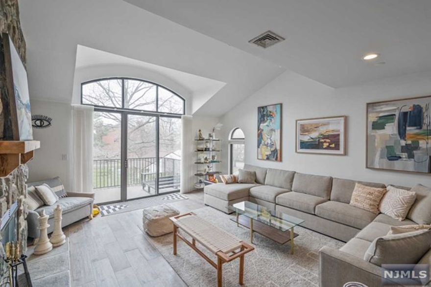 GlenPoint at its best! This 3 Bedroom Corner Duplex offer s a large open floor plan. The main floor boosts a large sunken LR with custom stone FPL and 10'ft sliding doors to the balcony, large DR, family room shares large open space with a modern eat in Kitchen with stainless appliances. Private elevator from garage to main level. The upper level offers a large Primary Suite w/ walk-in closet, large adjoining bathroom w/ double vanity, shower stall and jacuzzi tub, two additional spacious bedrooms, a hallway bathroom, plenty of closet space and a laundry room. The corner/end unit gets lots of sunlight as there are windows on 3 sides of the unit. 24hr security w/gatehouse, pool, tennis courts, community lodge, manicured landscaping. Pet friendly. NYC Express bus outside of gatehouse, approx. 5 minutes to GWB and close access to all major parkways. Unit is sold "AS IS" Co-owner holds a NJ Real Estate Sales license.