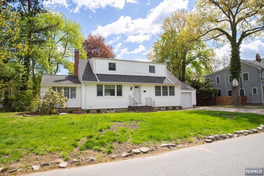 Wow! Great 4 bedroom, 2.5 home located on a quiet street close to schools, in desirable Harrington Park. Gleaming hardwood floors throughout with a light and bright modern kitchen. Their are 2 bedrooms and a full bath located on the first floor ideal for an office! The second floor has two nice sized bedrooms and a modern bath. The spacious back yard has a large deck which is ideal for entertaining. The basement offers an open concept with new flooring and a powder room. Just minutes to Harrington Park's award winning elementary and middle school plus parks and tennis courts. Great opportunity!