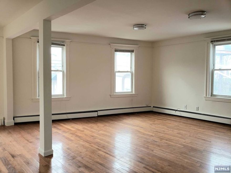 BEAUTIFULLY RENOVATED 2ND FLOOR UNIT IN A MIXED USED BUILDING OFFERS 3 BEDROOMS, 2 FULL BATHS WITH AN OPEN FLOOR PLAN WITH LOTS OF SPACE, WOOD FLOORS THROUGHOUT AND IN UNIT WASHER & DRYER. GREAT LOCATION, CONVENTIENTLY LOCATED JUST OFF ROUTE 46, CLOSE TO NYC COMMUTE, SHOPS AND RESTAURANTS. PERFECT FOR A HOME OFFICE.