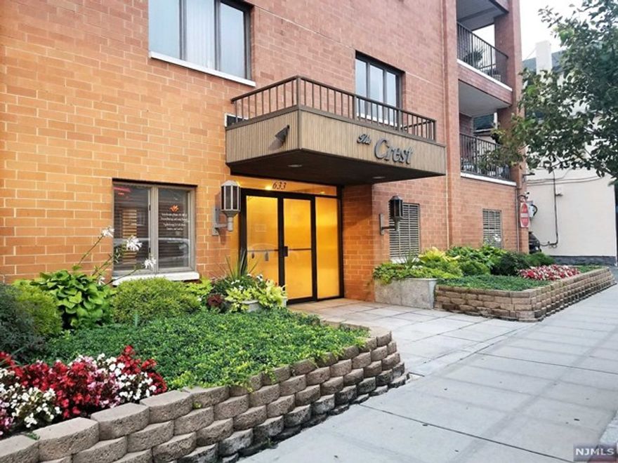 Experience urban luxury in this stylish corner-unit condo with gleaming hardwood floors, ample windows, and a private balcony showcasing captivating views. The sleek kitchen boasts granite countertops and stainless steel appliances, including a new mircowave and dishwasher. Enjoy the convenience of the in-unit washer and dryer, which are both just about a year old. This gorgeous unit is freshly painted and move-in ready, with new floors in the hallway and living room. It comes with two indoor parking spaces and the building has visitor parking. It is situated for prime access to the bustling entertainment and dining scene. Don't miss owning this modern condo with breathtaking views, close to the public library, the high school, parks, and public transportation. Contact us today!