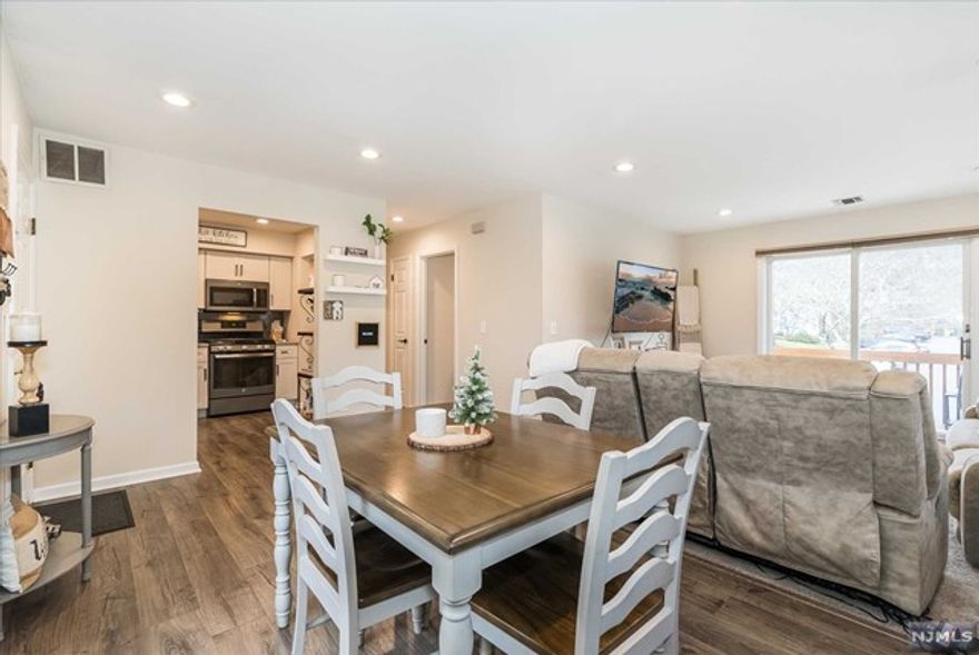 Beautifully updated 2nd floor unit in Pine Brook Village featuring 3 bedrooms & 1.5 baths! Feel the immediate sense of home from the second you walk into to the open concept living room & dining room! The living room is the perfect place to relax & offers plenty of large windows that give off great natural light! Sliding glass door leads out to deck that was redone in 2022. Kitchen is fully equipped w/ custom cabinetry, granite countertops, SS appliances & tile backsplash. The primary bedroom is quite spacious w/ vaulted ceilings & walk-in closet. The primary bath offers tub shower w/ sliding glass enclosure and storage vanity. There are 2 additional bedrooms in this unit w/ ample closet space & half bath w/ in-unit laundry. This unit also offers a 3rd floor storage unit that only a few other units in this develop offer! Pine Brook Village offers community pool & playground. This unit is conveniently located near NYC transportation, majoy highways, schools, shopping & restaurants.