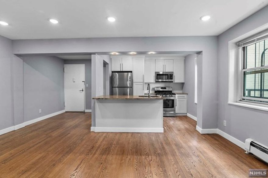 Quality renovation with a flair for a design! Beautiful 2 bedroom condo with garage parking in the heart of Fort Lee. All new appliances including refrigerator with top freezer, gas range, over the range microwave, dishwasher; custom light fixtures and finishes throughout. Heat and hot water included. Elevator building on-site laundry, park, bus stops, shopping, restaurants, GWB, NJ Highway access and Palisades Pkwy entrance within half mile radius. Move in/out fee and deposit required by building. Sorry, no pets. Owner holds NJ Real estate License.