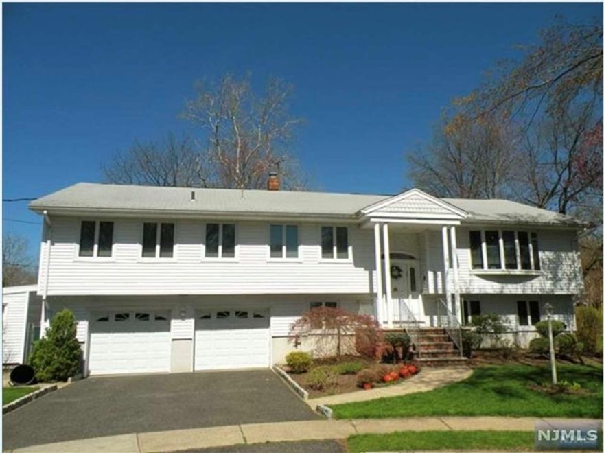 Renovated and expanded Bi-Level on great cul-de-sac! Walk to Ridge Ranch school! Pristine home! Main level features LR, DR, newer eat-in kitchen with granite counters/stainless steel appliances, large family room addition with sliding glass doors to deck, four bedroom & 2 Bathrooms including master suite with full bath/walk in closet/sliders to deck. Ground floor offers fifth bedroom, second family room, third full bathroom, entrance to yard. Large property with in-ground pool! Hardwood floors throughout main level, central air, two-car garage. Credit check and interview required.