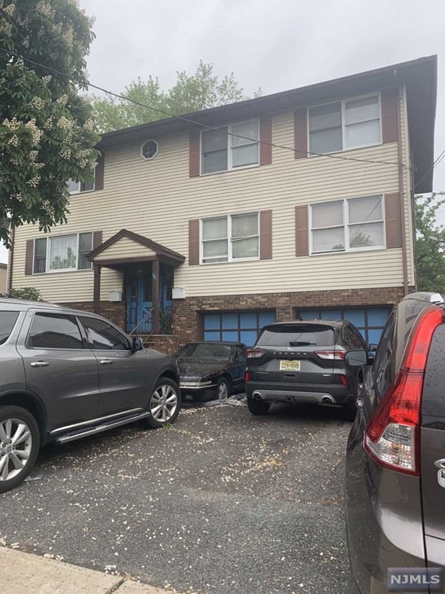 Spacious 3 Bedroom with newer bathroom,formal dining room, 2 parking spaces, large eat-in-kitchen with dish washer, hook ups in basement for stackable washer and dryer,central air conditioning. Walking distance to NYC bus, route 46 and major highways.