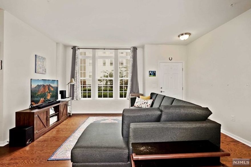 MOVE-IN READY AUGUST 1st. Experience living in Bergen County's most sought-after Townhome community living - Liberty Square at Wesmont Station, offering ON-SITE -NJ Transit train station, Sports fields, children playgrounds/park, wine & coffee shop AND steps away NJ transit Bus Stop. Your home offers perfectly sized 2 bedrooms, 2 bathrooms with attached 1 car garage & 1 car driveway- 2 parking space in total. HOME WILL BE FRESHLY PAINTED FOR NEW TENANTS. NEW WASHER-DRYER. Ground Level offers an open concept living-dining-kitchen areas, coat closet, full bathroom, SS Appliances, granite counter-tops & door to the attached garage. Second floor caters to your in-unit washer/dryer needs, a full bathroom, master bedroom & a 2nd bedroom. Tenants pay-1 months of realtor fee, 1.5 security deposit, all utilities. Minimum 1 year lease required. Need 24 hrs of notice required.