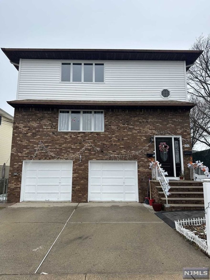 Renovated 2nd floor apartment, move-in ready! 3 bedrooms and 1.5 baths. Updated kitchen and bathrooms. Freshly painted throughout. Gleaming hardwood floors. Large living room, open to dining room. Primary bedroom has half bath. Includes 1 parking spot. Garfield has plenty to offer including multiple parks, restaurants, easy access to highways/parkway and direct train to NYC. Proof of income, credit report and interview required. upfront fees are 1 month rent, 1.5 month security and 1 month broker fee. Landlord may consider one small dog or cat under 15 lbs.