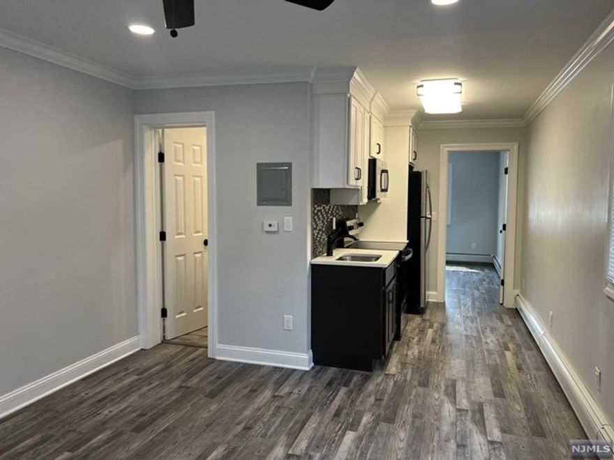 Totally updated 2nd floor unit! Parking available in the rear parking lot for tenant. Great in town location close to shopping and transportation Tenant pays own utilities, Landlord responsible for out side maintenance. Window ac units .