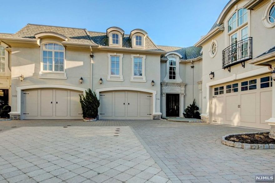 A magnificent Bellaire townhome overlooking Alpine Country Club has 6000 sq. feet of complete luxury! The home features Brazilian cherry floors, extensive millwork, elevator, 3 fireplaces a cherry paneled office and a Crestron system. The gourmet kitchen includes all Viking appliances, designer cabinets and granite counter tops. The master suite has a large sitting room, spa bath with steam shower, radiant heating and a built in cedar closet. The lower level features an expansive recreation space, powder room, gym, full bath and home theatre room. Truly a must see!!