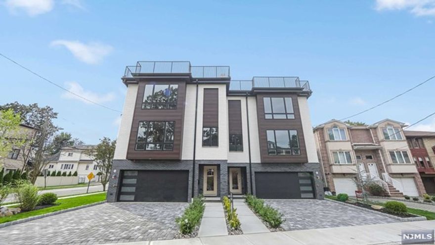 Welcome to this astonishing oversized new build by a premier builder, Senatore and Sons Dev LLC. This Duplex offers oversized rooms throughout and a rooftop deck/suite to enjoy. The kitchen boasts GE cafe appliances, gas range, quartz countertops, Island with waterfall and breakfast nook.24'x13' living room w/fireplace. Dining room 13'8 x19'. Oak and porcelain floors throughout the home. The primary bdrm and bath is breathtaking inclusive of his & her sinks, showers, and closets. very large second & third bedrooms, full bath, laundry and closets complete the second floor. The massive 26x16 rooftop deck is combined with a rec room suite complete with a wet bar and 1/2 bath. The outside facade is a combination of brick, Hardi plank and aluminum MAC strong. 400 series ANDERSON windows, 2 5 ton A/C units, 2 zone hydronic heat. Ground floor and garage have supplemental baseboards off a NAVIEN combie boiler/water heater. No shortcuts here with respect to quality on this build.