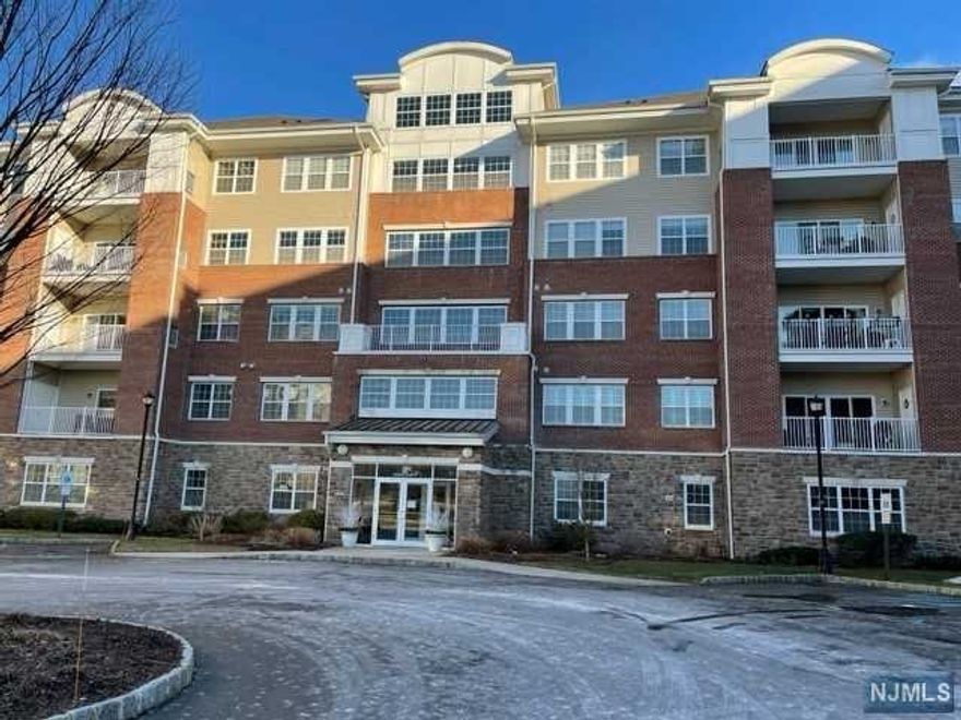 Wanaque Reserve offers a unique North Jersey experience set on approx. 450 acres. The community features a magnificent 20,000 sf recreation center, it is the gathering place for residents, a center for socializing and entertaining and fitness center. Pick you activities from the many organized on and off site. or enjoy quite time in the library. The Cafe offers delivery.This corner Colfax unit provides more windows and views of the mountain and pond. Upgrades include tile balcony,crown moldings,extra tile around tub & shower, alarm system, kitchen with granite countertop, 18 drawer bathroom cabinet. Features include coat closet in foyer, three panel interior doors, boxed ceiling Master bedroom suite with walk in closet, guest bedroom with double closet. The monthly fee includes water, cable and internet access. 2 garage parking spaces steps away from the foyer entry way.