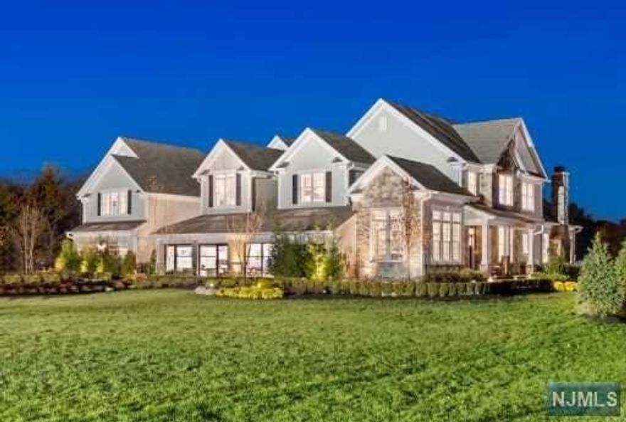 Stunning Valeri home w private views of the adjacent Nature Preserve. One of the most popular selling plans in the community, this home comes complete w an expanded garage, expanded great room w fireplace overlooking the outdoor living room w an addtl fireplace and nature preserve, a grand 1st fl primary suite w dual walk-in closets, a large 1st floor laundry room, 3 addtl bdrms, 2 addtl full baths and a finished basement w powder rm. The outdoor living room w fireplace opens to a deck complete w an outdoor kitchen. Spectacular interior finishes include herringbone hardwood flooring throughout the 1st and 2nd floors, a stunning kitchen with Jenn Air Noir appliance package and quartzite countertops w waterfall island and full height backsplash, beautiful custom built-ins in both the dining room and flanking the great room fireplace in addition to so much more! This is the final new construction home available in the community complete w full builder warranty.