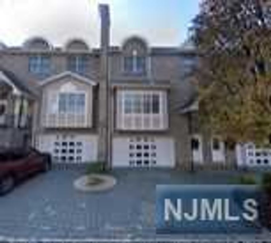 SPACIOUS AND WELL MAINTAIED TOWN HOUSE IN CRESSKILL. LARGE LIVING ROOM WITH FIREPLACE, NICELY UPDATED KITCHEN LEADING DECK, FINISHED GROUND FLOOR, HARDWOOD FLOORS THROUGHOUT, CENTRAL VACUUM, 2 CAR GARAGES. THIS COMMUNITY IS CLOSE TO SCHOOLS, PARKS, EASY ACCESS TO NYC.