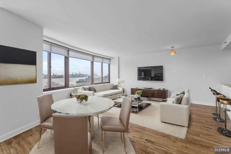 Best views in The Palisades! Faces unobstructed panoramic views of the Manhattan Skyline and Hudson River. Experience luxurious living in the largest 1 bedroom 1 full bath unit 1084 square feet, new luxury vinly plank flooring, floor molding, freshly painted and recessed lights throughout. Modern kitchen with granite countertops and stainless steel appliances. Washer/Dryer in unit, His and Hers Walk-In Closets in Bedroom, includes 1 garage parking spot. Building amenities include 24-HR Doorman, spacious fitness center, outdoor pool, BBQ area, conference room, kids playroom, courtyard and pet friendly building. Excellent location in Fort Lee, everything is within easy reach, easy commute to NY buses and ferry. Close to shopping, restaurants, movie theater, banks and schools. Ideal choice for those seeking the vibrant city lifestyle.