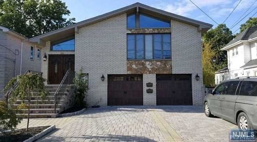 TOTALLY GARCEFULLY RENOVATED HOUSE LOCATED ON SO QUEIT STREETYET SO CONVENIENT TO COMMUTE YO NYC. TWO ROOMS CONVERTED TO ONE LARGE MASTER BED ROOM TO SLIDING DOOR TO HUGE DECK TO LARGE BACK YARD, TWO MORE LARGE BED ROOM, FULL BATH. 1 CAR GARAAGE AND 2 CAR DRIVEWAY PARKING ARE INCLUDED IN THE RENT.