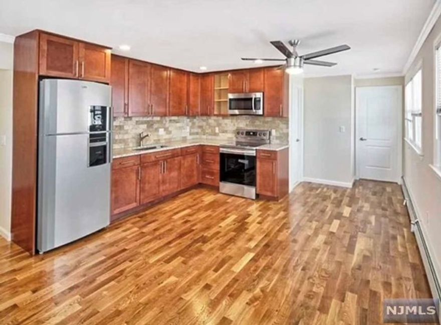 Your search ends here !! Tastefully renovated apartment on second floor. Bright and spacious 1 bedroom, spacious living room with hardwood floors, gorgeous kitchen with plenty of cabinetry, granite counter tops and tumbled marble back splash and all stainless steel appliances, gorgeous bath, storage room, laundry, parking for 1 car and Pet friendly !! Call us for a private tour