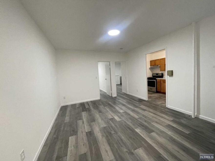 Welcome to 197 Lafayette Place! Newly renovated two bedroom with brand new floors, bathroom, kitchen and a ton of natural light and closet space. Unit comes with a parking space and is located on the first floor. Great location for NYC commuters with buses and walking distance to nearest restaurants and shops. Close to route 4 and route 17!! Available ASAP!