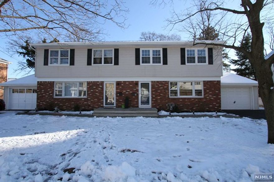 Welcome to 13 Cedar Pl! Get ready to fall in love with this 3 bedroom/1.5 bath duplex. Features include a brand new kitchen and baths, fresh hardwood floors, a finished basement, great storage, laundry in unit, a 1 car garage with a private drive way, and a private fenced backyard. Enter in a sunny living room which flows back into the kitchen and dining space. The brand new kitchen features stainless steel appliances and quartz counter tops. Head outside to your private backyard, upstairs to the bedrooms (with great closets)or downstairs to your spacious finished basement. This home is perfectly situated in downtown Hawthorne. A quick walk to the Goffle Brook park, tons of restaurants and the train station with direct lines to Hoboken and NYC.