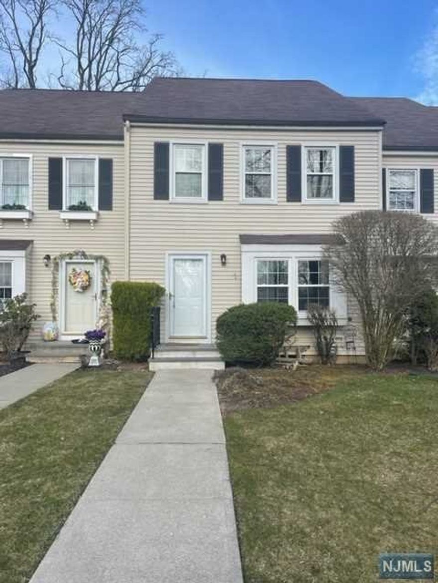 Recently renovated, newly stained wood floors, completely remodeled powder room and freshly painted entire unit. Updated master bathroom. newer basement floors. large bedrooms w/great closet. laundry area conveniently located in the 2nd fl. Large deck to enjoy on nice days. short walk to pool, clubhouse and playground. First floor features roomy eat-in kitchen, inviting and open living & dining room w/ fireplace and sliders to large private deck. Second floor has two large bedrooms and laundry area. Full basement has new floors and large storage space/utility room. Close to downtown shopping & restaurants. Top rated schools. Community offers indoor & outdoor pools, sauna, gym, tennis courts, playground, party room w/kitchen. Unit also available furnished at additional cost