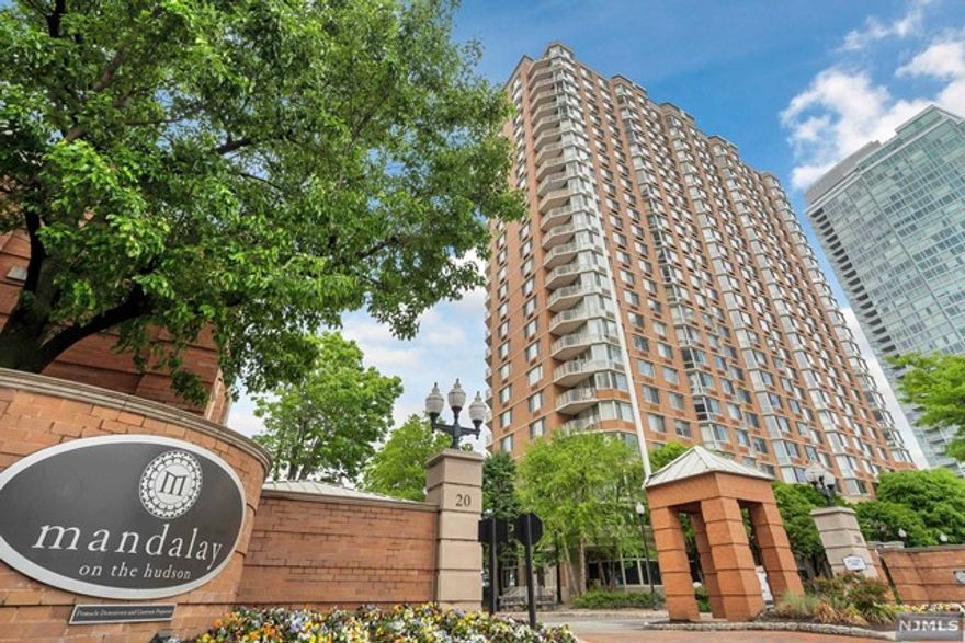 Welcome to this waterfront southern exposure sun filled One Bedroom with partial World Trade Center and water views. It features hardwood flooring throughout, granite kitchen countertops, stainless steel appliances, updated bathroom, washer and dryer, freshly painted. MANDALAY ON THE HUDSON is any easy commute to NYC via path, ferry & the light rail a few blocks away. Boasting a full service building with amenities including 24/7 doorman, on-site super, gym, amazing outdoor pool, lounging deck, BBQ area, residence lounge, pool table, children's playground, adjacent private parking garage with assigned parking (deeded to the unit) and more. This will not last!!