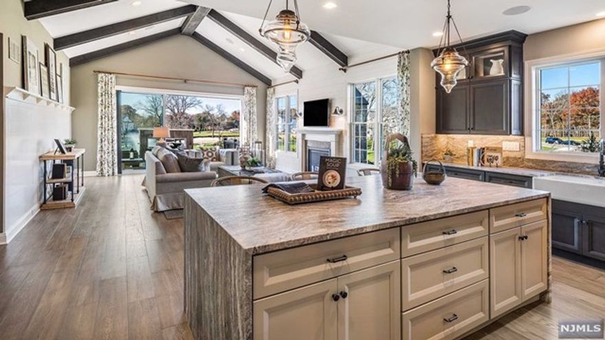 The Reserve at Franklin Lakes, the epitome of luxurious living combined with captivating beauty that has been carefully designed to preserve the essence of this exquisite town. The Ashton's dazzling 2-story foyer offers views of the formal 2-story DR, elegant turned stair, and formal living room. The kitchen impresses with a large center island that overlooks the Expanded Fam Rm. The Grand Master Suite w tray ceiling has large WIC and luxurious bath w dual-sink vanity & luxe shower w seat. The 2nd Fl boasts 2 bedrooms each w a WIC, a full bath, and a vast loft overlooking the DR and foyer. Additional features include 1st fl powder rm & laundry rm; and large finished basement w powder rm. Other features incl 9'ceilings, H/W throughout the majority of the home, superior features from brand name manufacturers such as Kohler, Jenn-Air, and Andersen, and multi zone HVAC w/ humidifier.