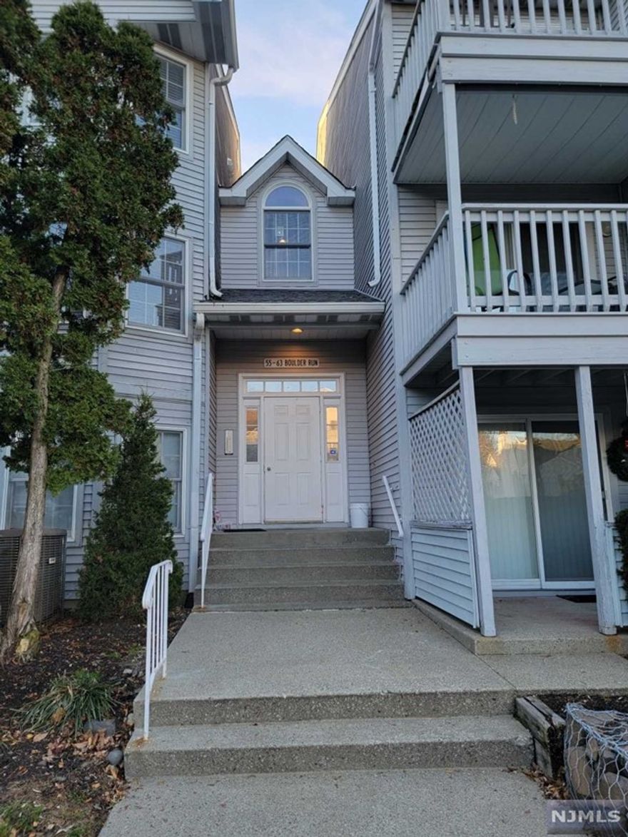 Welcome To Garret Heights! This Spacious and well Maintained Condo Offers 2 Bedrooms & 2 Full Bathrooms. Open Concept Living Room with a beautiful wood burning fireplace, Dining Room and Kitchen with stainless steel appliances only a few years old. The Private Balcony/Deck/Patio Offers Breathtaking Views of the mountains and can be used for all seasons! The Very Generously Sized Primary Bedroom Offers An Ensuite With A Jetted Tub & Stand Up Shower, and Double Closets. The Second Bedroom Offers Plenty Of Space with a semi walk-in closet as well. Newer HVAC System with water heater only one year in the laundry room with Washer and Dryer. Lots of storage with Pantry, Utility Room/Laundry Room and Linen closets as well. Make This Is A Truly Turn-Key Home! Garret Mountain Is Just A Short Distance Down The Road and in Close Proximity To Major Highways, Restaurants, Shopping, Schools, & Houses Of Worship. Perfect for a commuter as well! Schedule your viewing today!