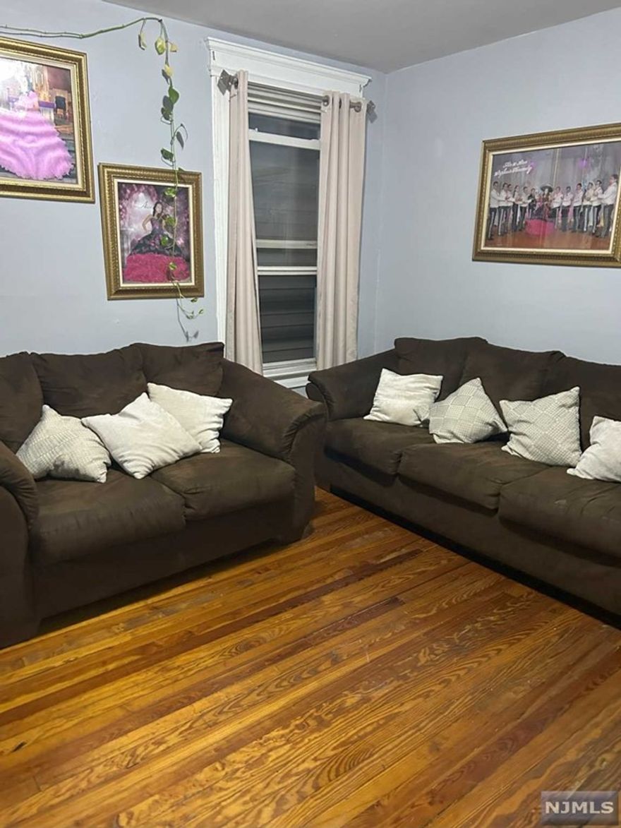 3 Bedroom apartment on the 2nd floor of a two family home. Unit includes hardwood floors throughout, one large bedroom with a walk-in closet, two smaller bedrooms, living room, large eat-in kitchen, bathroom, pantry/laundry room with washer/dryer hookup, and use of the yard. On street parking. **NO PETS**LANDLORD PAYS HALF THE BROKER FEE**